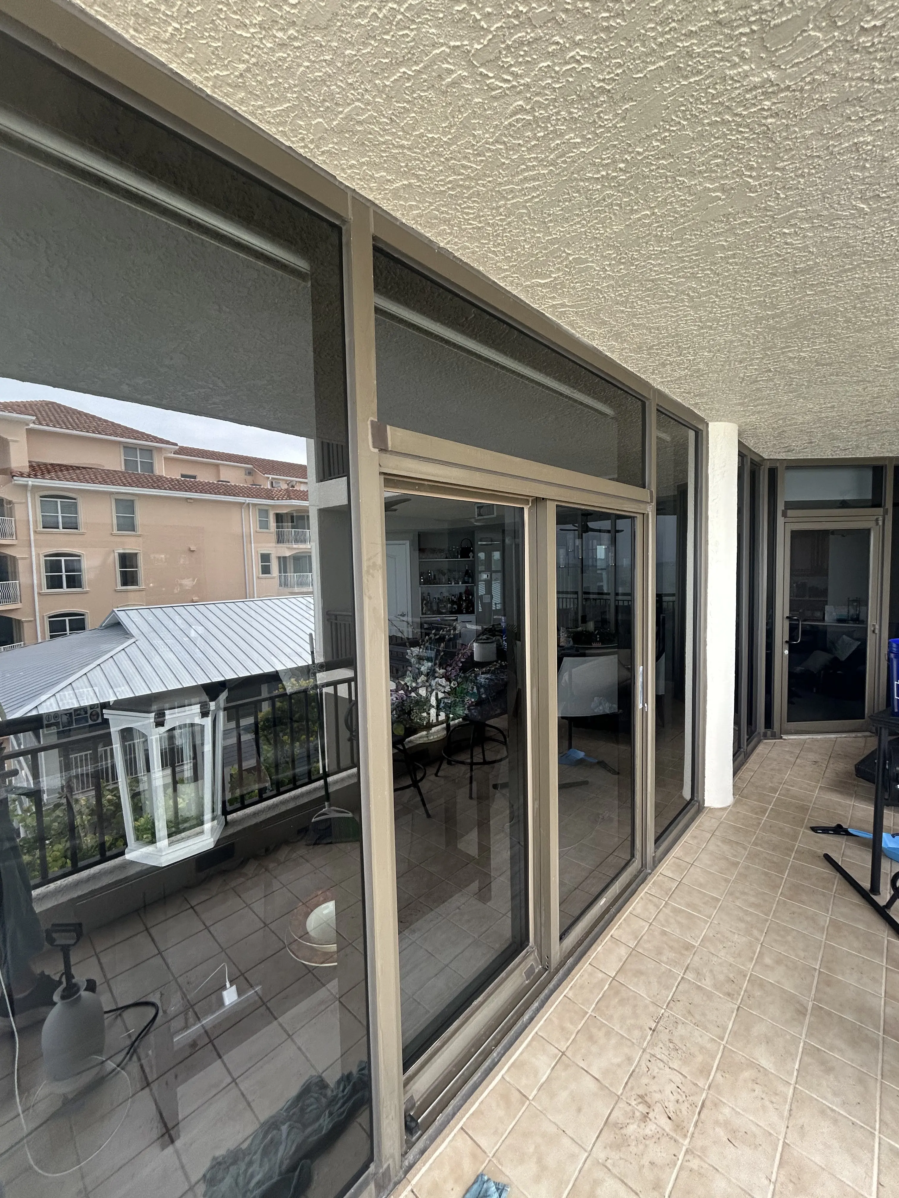 Clean condo balcony glass after window cleaning