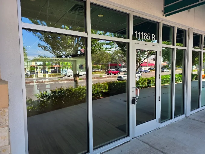 Clean storefront windows after commercial window cleaning